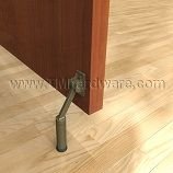 A kickdown Door Holder installed on a door