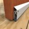 zero international 321 automatic door bottom applied on interior wooden door in closed position