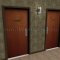 Bathroom Sign-"WOMEN" in US10 finish applied to interior door