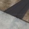 Pemko Adjustable Carpet Divider on floor