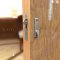 Adams Rite 5017 Deadlock installed on door (thumbturn not included)