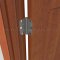 Deltana DTDSB4R5, Plain Bearing, Standard Weight, Brass Hinge on a Wooden Door