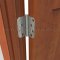 Deltana DTDSB4R5-RZ, Plain Bearing, Full Mortised, Brass Hinge on a Wooden Door