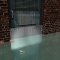 Flood Barrier mounted into door frame, preventing flooding