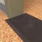 NGP 430E Utility Threshold in DKB Finish applied to floor of door entrance