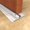 With Utility Threshold as Door Stop and Seal
