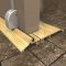 Pemko 254x226FG Gold Anodized Latching Panic Threshold with Vinyl Seal on Metal Door