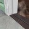Door sill with rubber seal installed on door