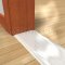 Door Threshold on a Wooden Floor
