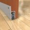 Clear Anodized Pemko Automatic Door Bottom #430 Semi-Mortised into Wooden Interior Door with Seal Open