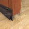 Dark Bronze Anodized Door Bottom Sweep with Rain Drip Cap on Interior Door