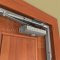 Pemko Z Bracket with 1-1/8" offset in Zinc Coated Steel applied to interior door