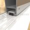 L Shaped Door Shoe 154 with Pile Brush Seal in Clear Anodized Finish Applied to Hollow Metal Door