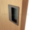 Ives Decorative Cabinet Pull Installed in a Door Cabinet - US10B Finish