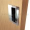 Ives Decorative Cabinet Pull Installed in a Door Cabinet - US26 Finish