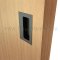 Ives Decorative Rectangle Cabinet Pull Installed in a Door Cabinet - US10B Finish
