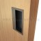 Ives Decorative Rectangle Cabinet Pull Installed in a Door Cabinet - US10B Finish